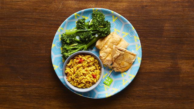 Nandinos Chicken Breast Fillet with option sides of Long Stem Broccoli and Spicy Rice