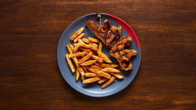 5 Chicken Wings on a plate with an optional side of PERi-Salted Chips