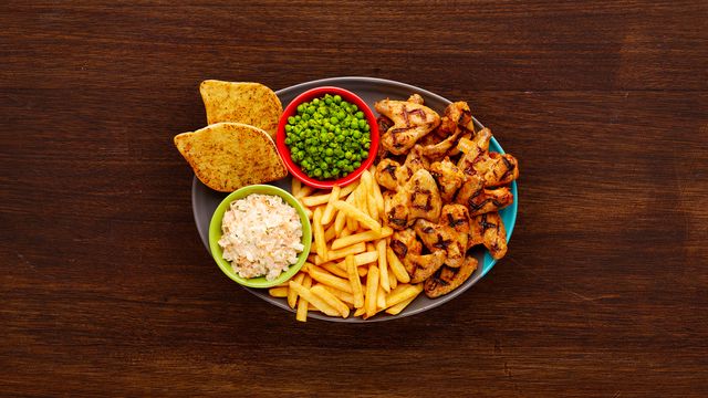 15 Wings on a Platter with Chips, Garlic Bread, Coleslaw & Macho Peas