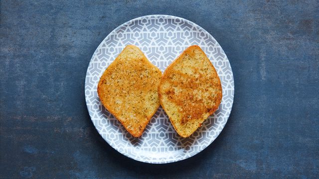 A portion of Garlic Bread on a plate